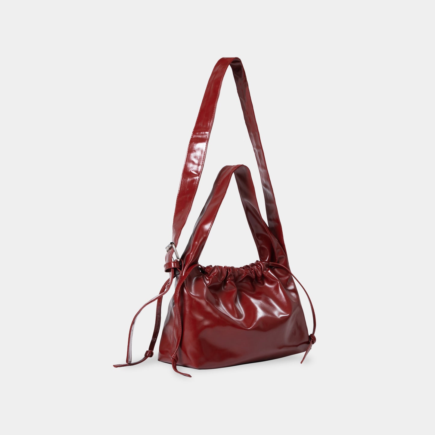 ARYA Red Drawstring Crossbody Bag ASTOUD