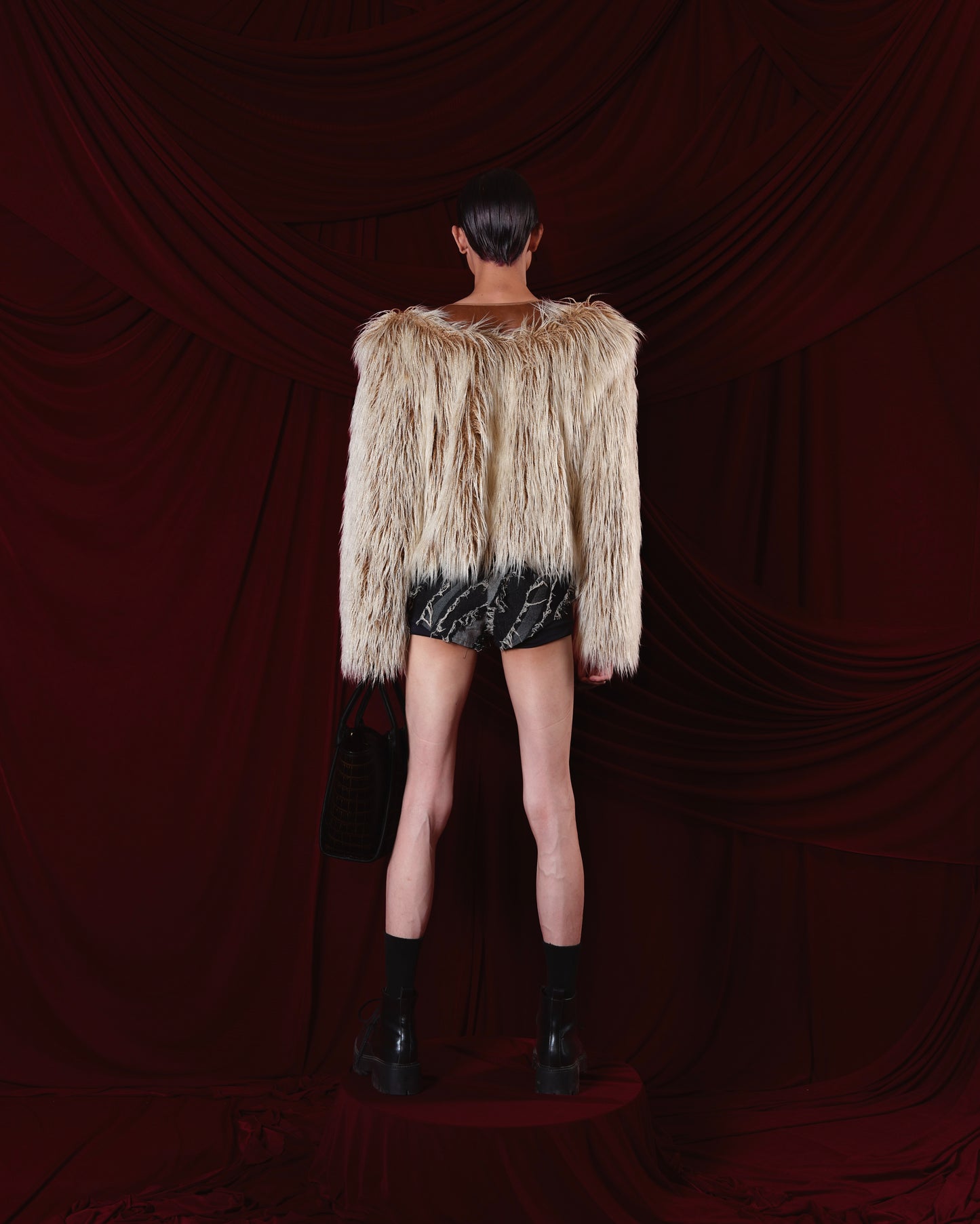 mai-tranh-feathered-jacket an heritage astoud