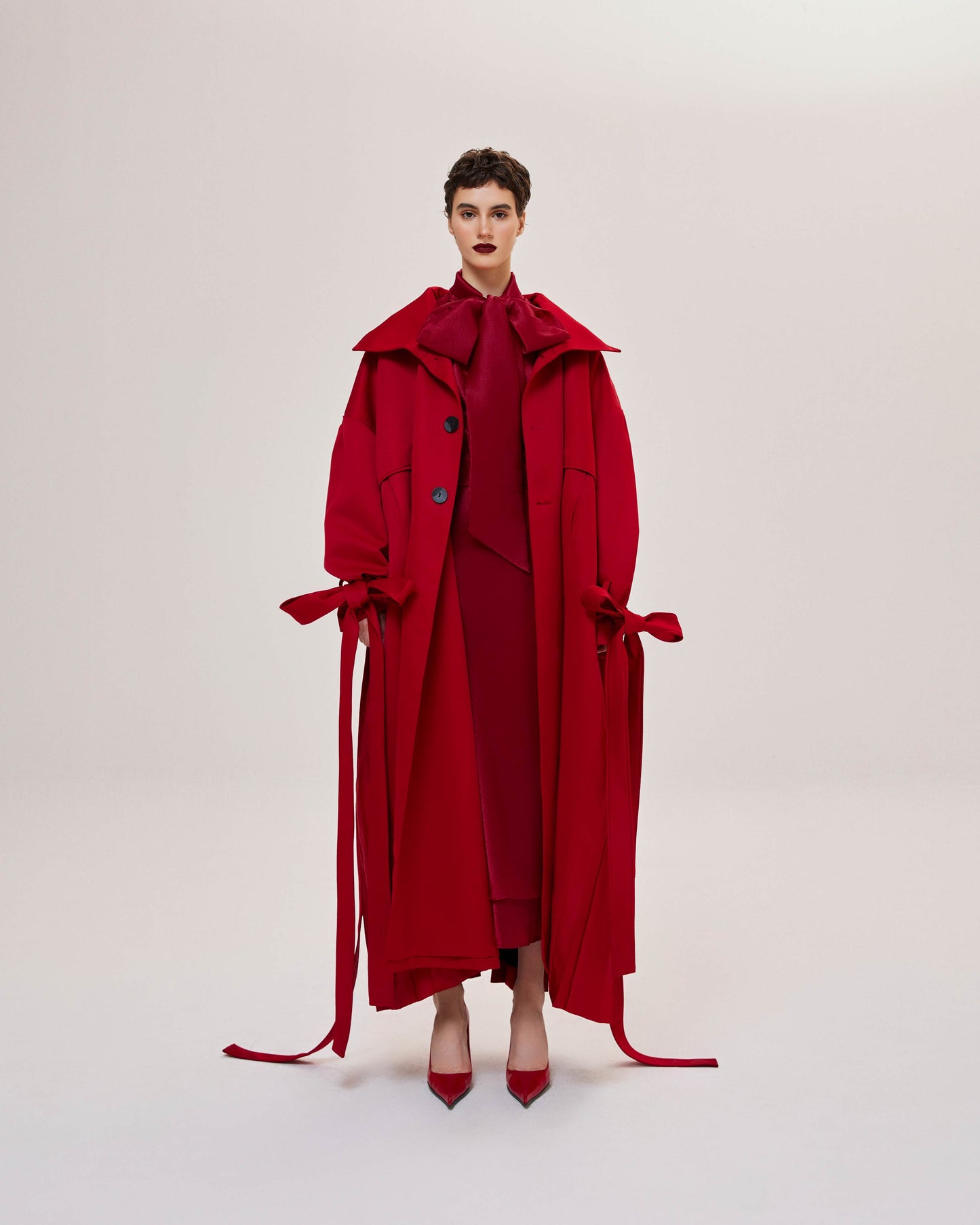 Pardessus plissé rouge
