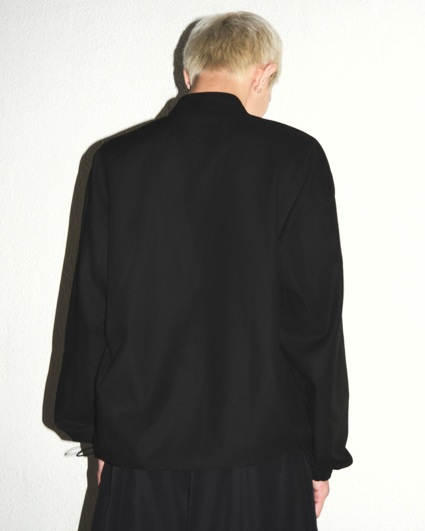 black-buttoned-jacket the idiot astoud