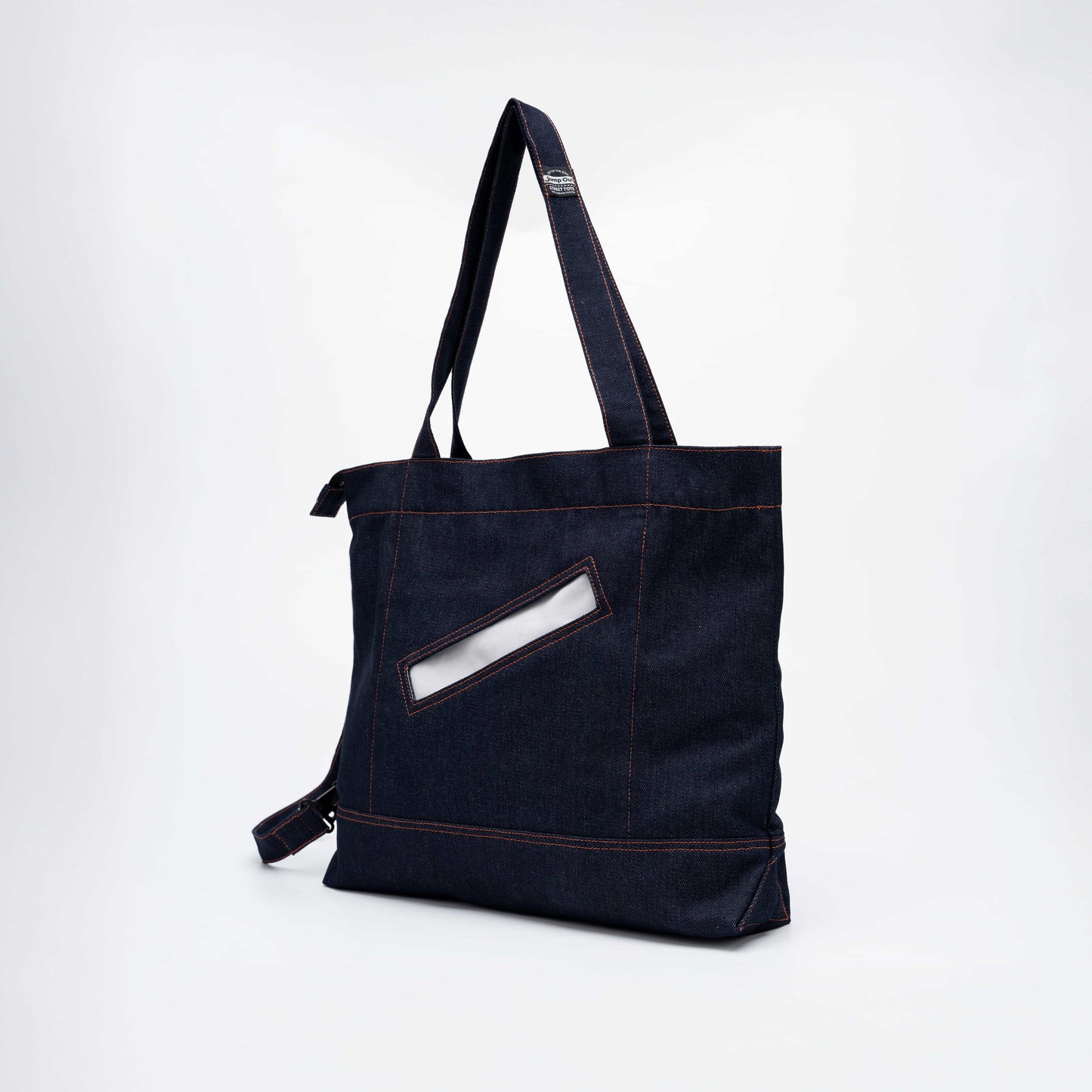 strap-3-tote-raw-denim-indigo jump out astoud