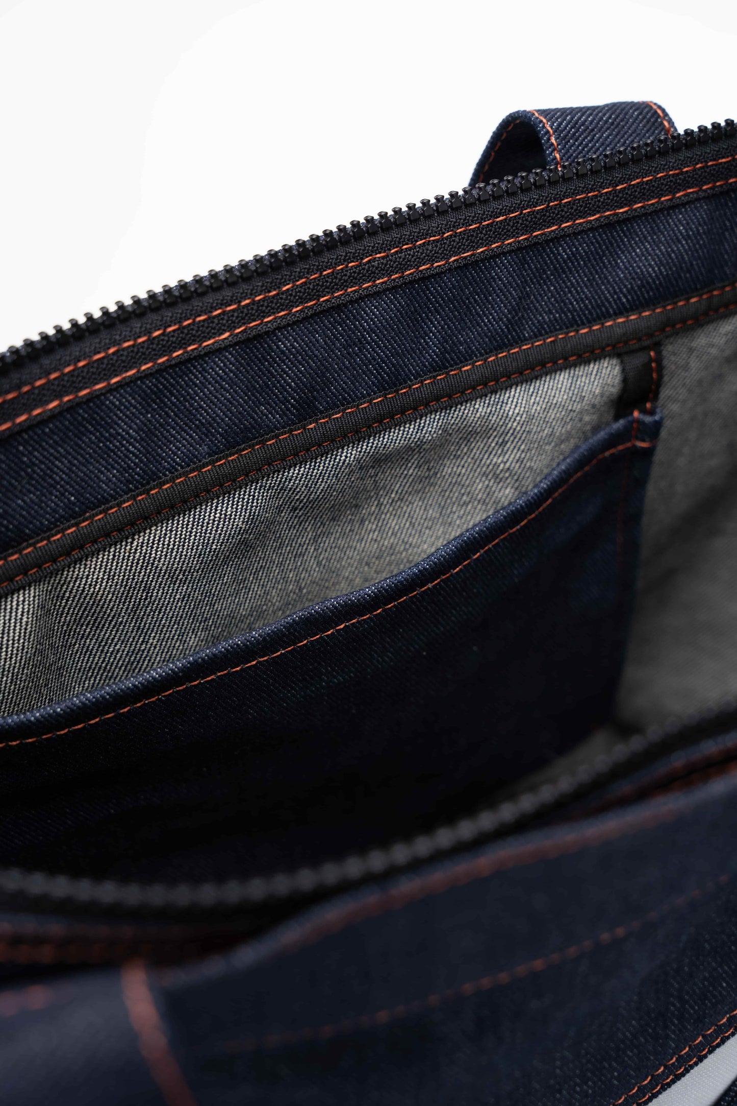 strap-3-tote-raw-denim-indigo jump out astoud