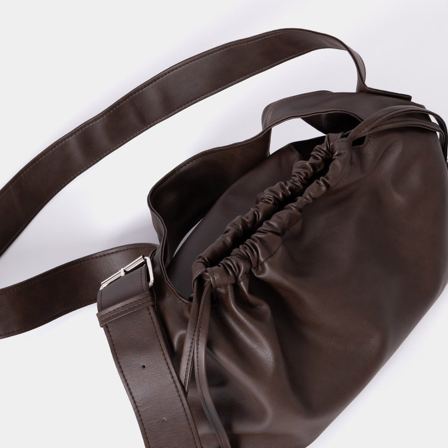 brown-drawstring-crossbody-ARYA-astoud