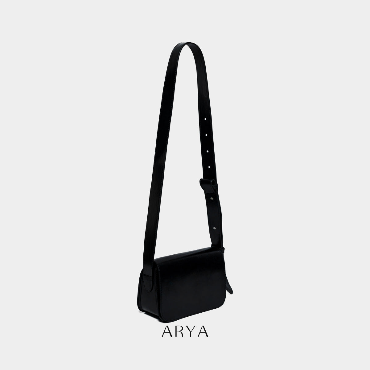 BLACK DAILY FLAP BAG by ARYA in synthetic microfiber leather, dimensions 8.66 x 5.51 x 3.15 inches, available at ASTOUD.