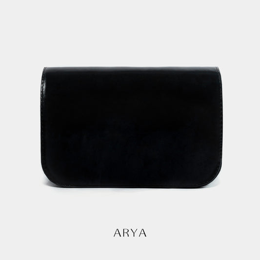 BLACK DAILY FLAP BAG by ARYA in synthetic microfiber leather, dimensions 8.66 x 5.51 x 3.15 inches, available at ASTOUD.