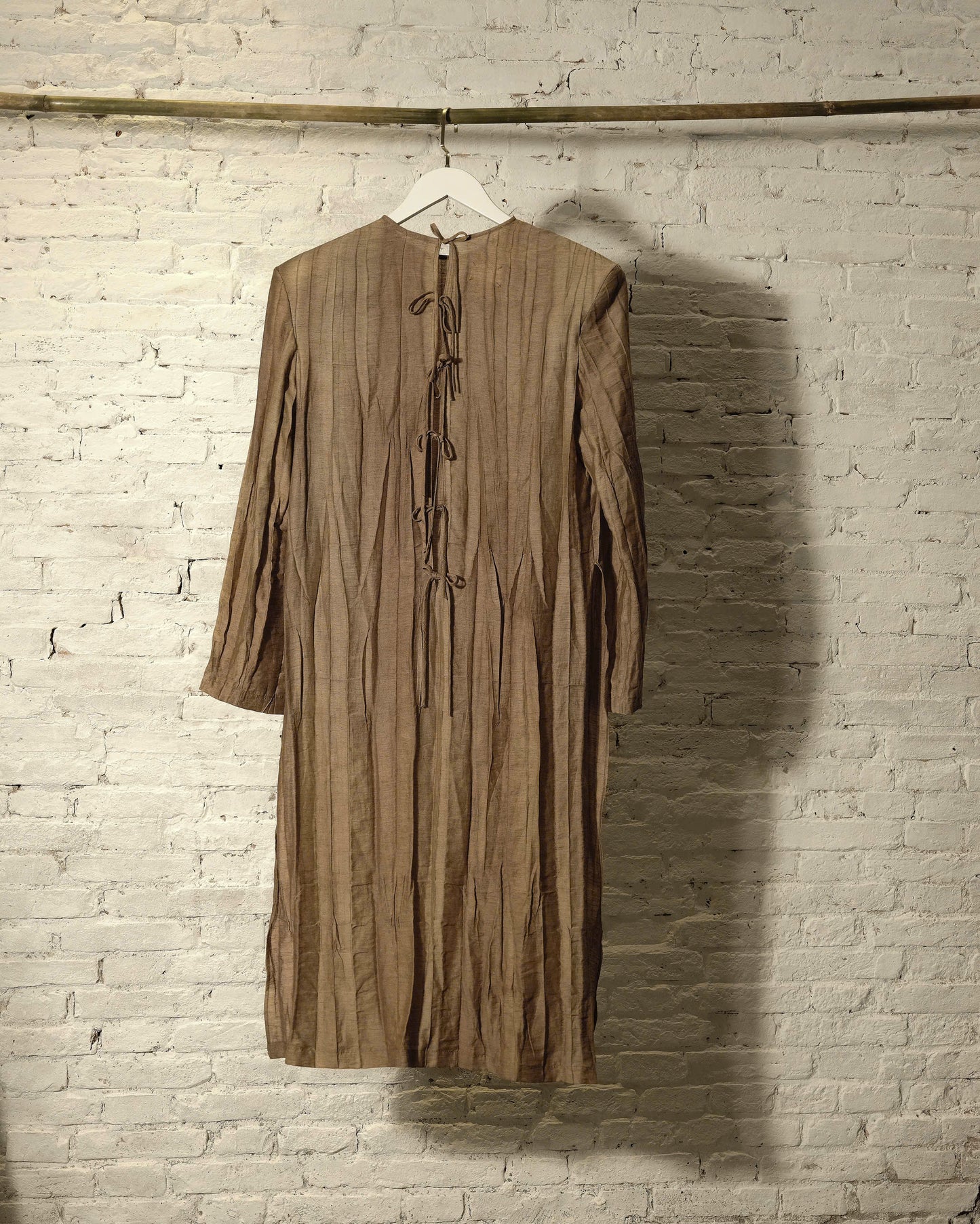 muddy-brown-tran-ai-ao-dai an heritage astoud