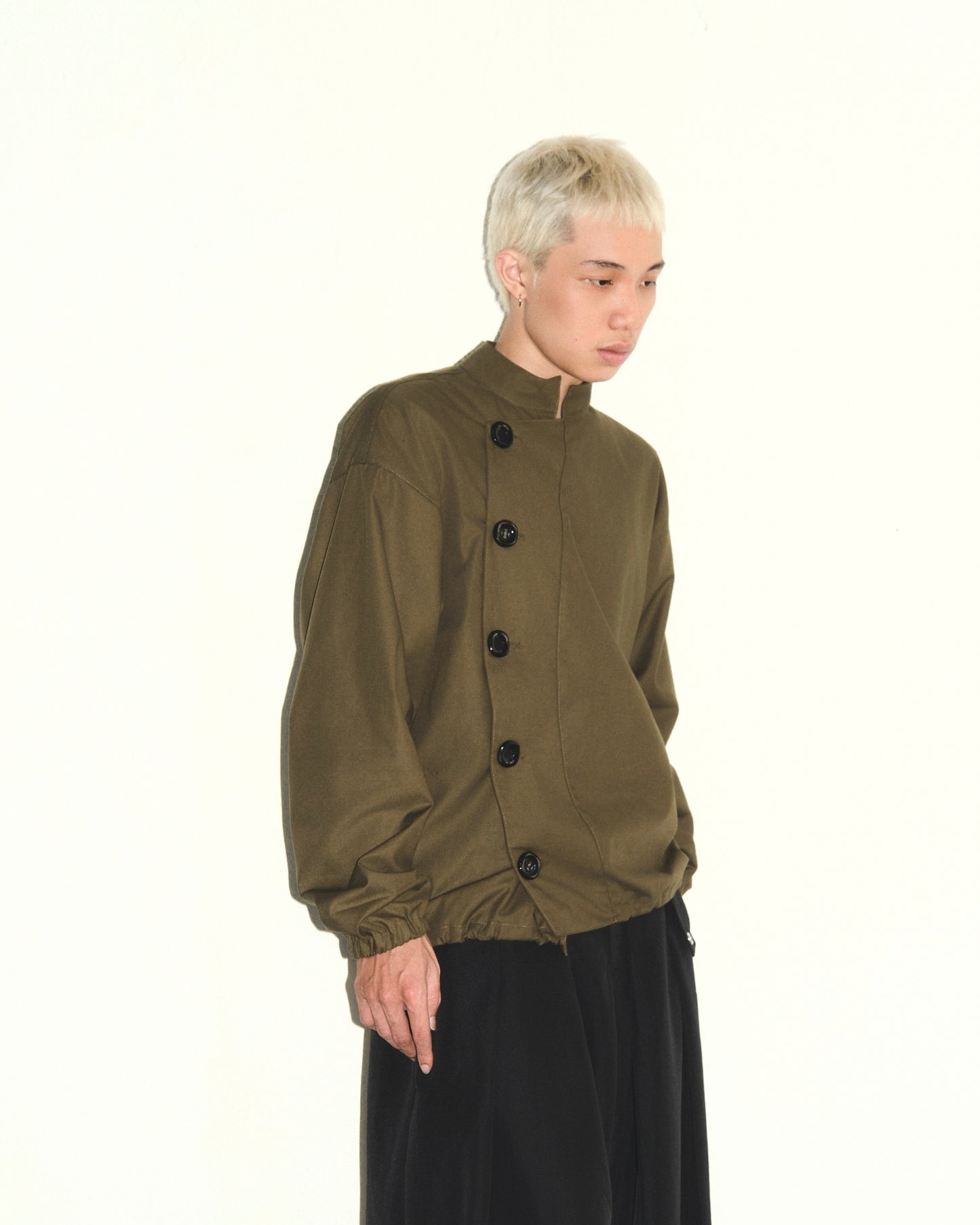 olive-buttoned-jacket the idiot astoud