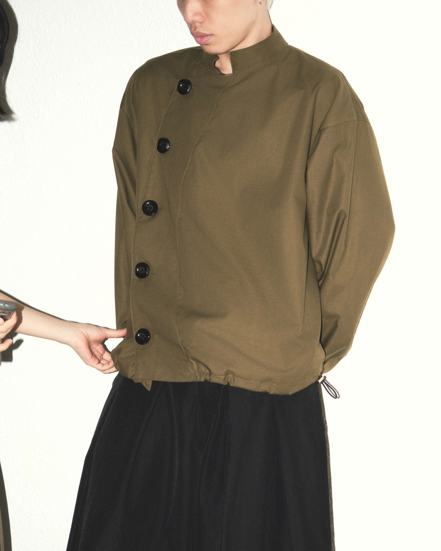 olive-buttoned-jacket the idiot astoud