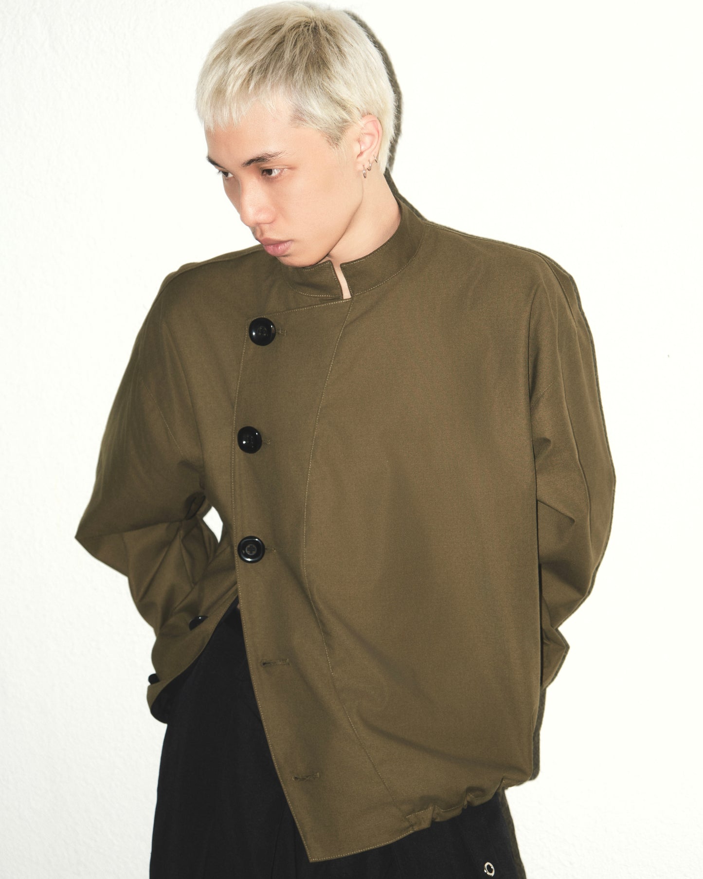 olive-buttoned-jacket the idiot astoud