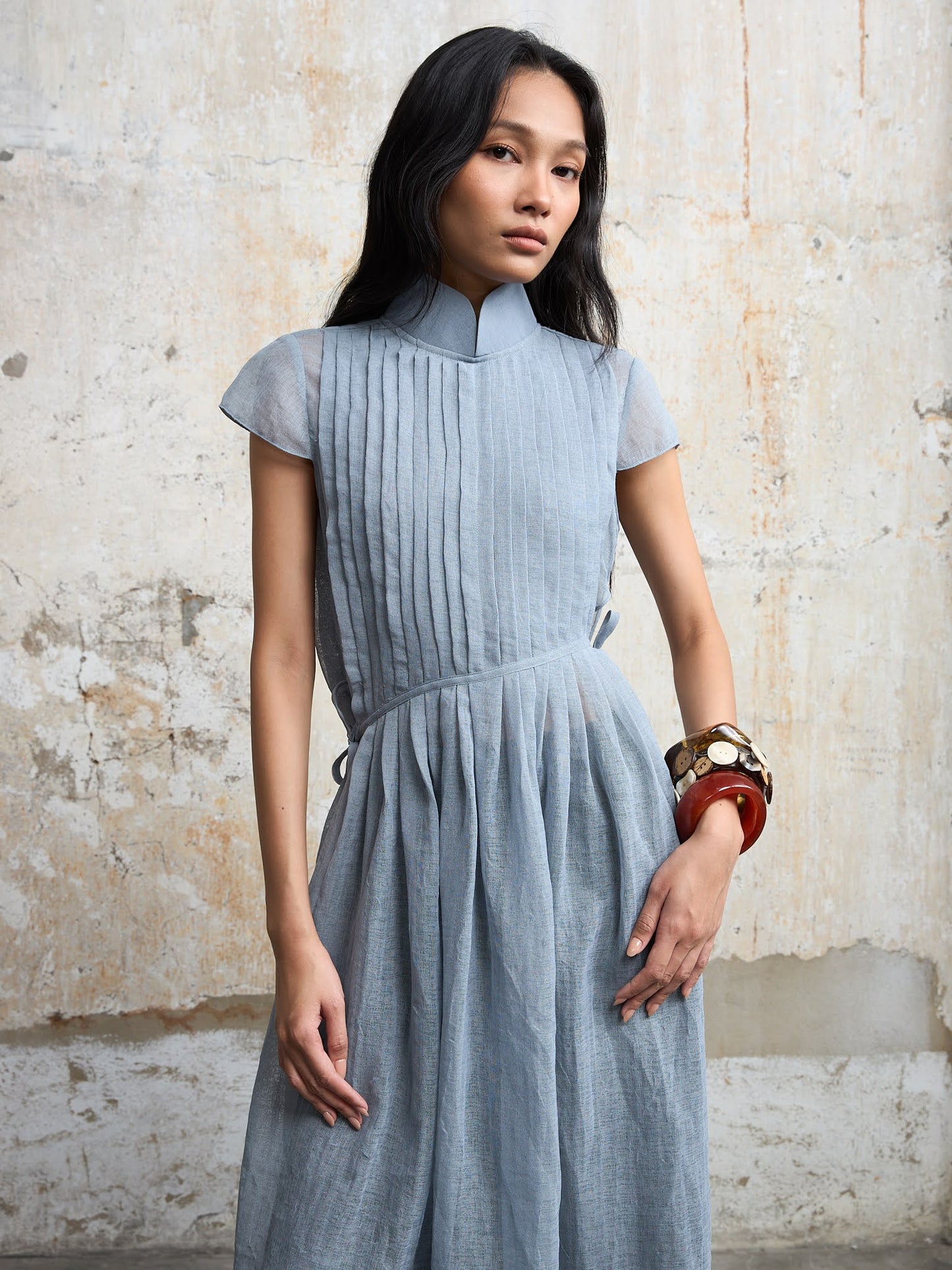 Áo dài xếp ly