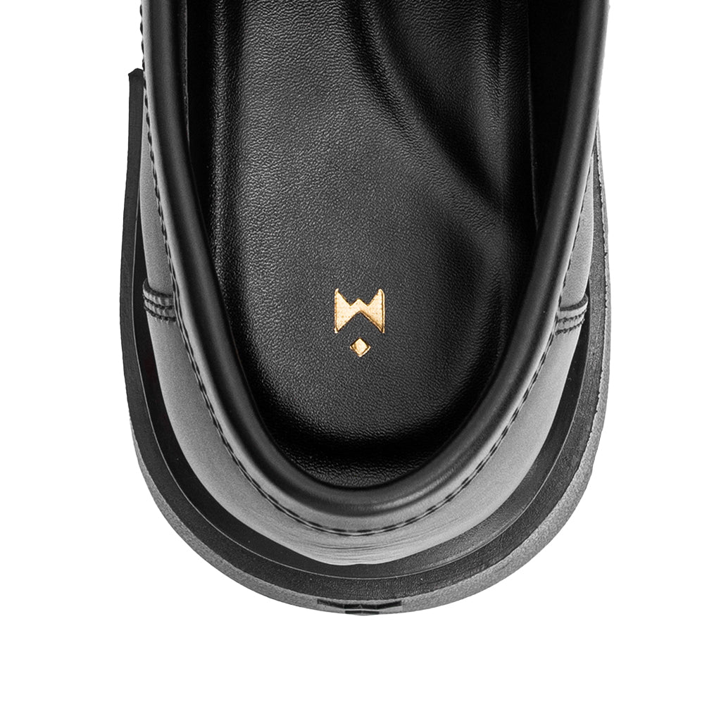 the-chunky-wolf-ss24-black-tassel-loafer thewolf astoud