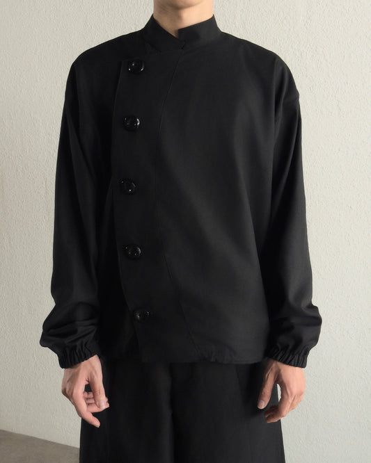 black-buttoned-jacket the idiot astoud