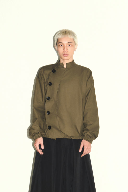 olive-buttoned-jacket the idiot astoud