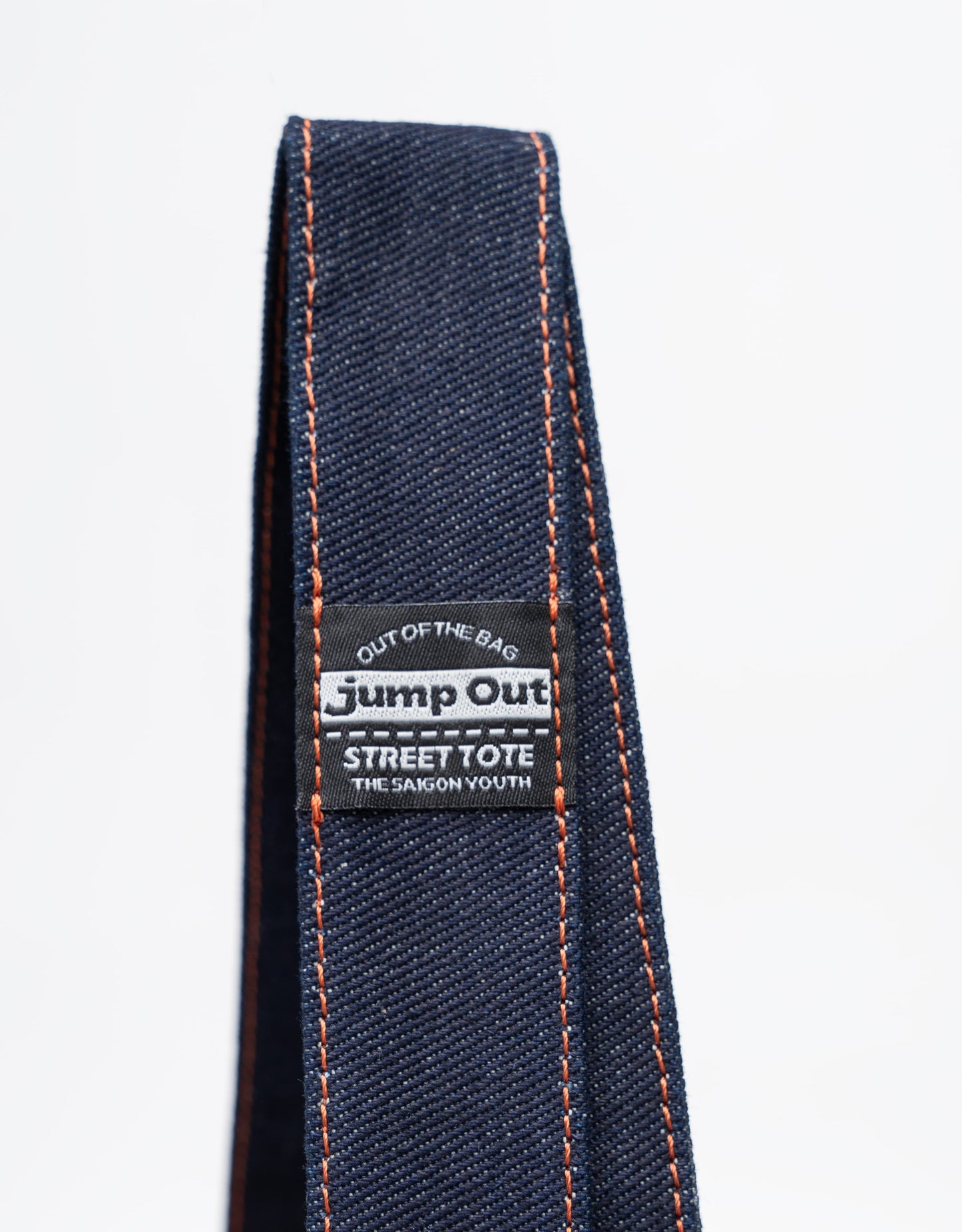 strap-3-tote-raw-denim-indigo jump out astoud