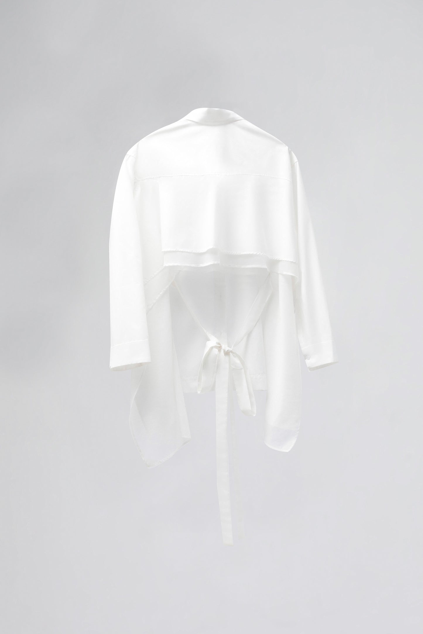lẳng-lơ-open-back-tied-shirt-whitE-CAOSTU-ASTOUD