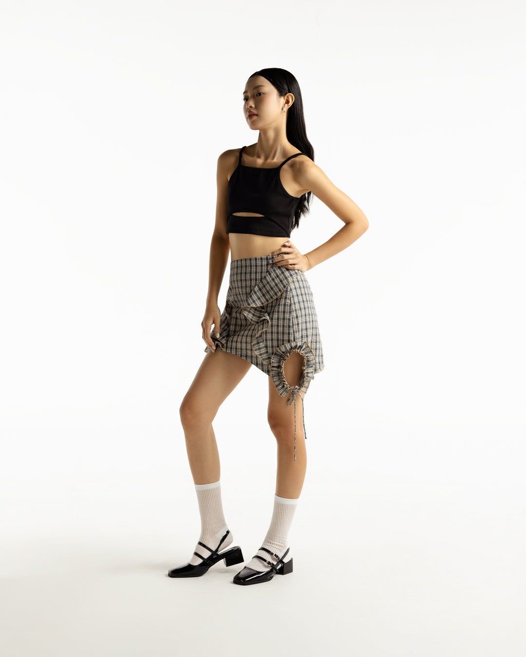 THAP THOANG SKIRT - cotton mini skirt with ruffles, flounces, and side cut-out with bow tie - ASTOUD, PROFILEMOMO.