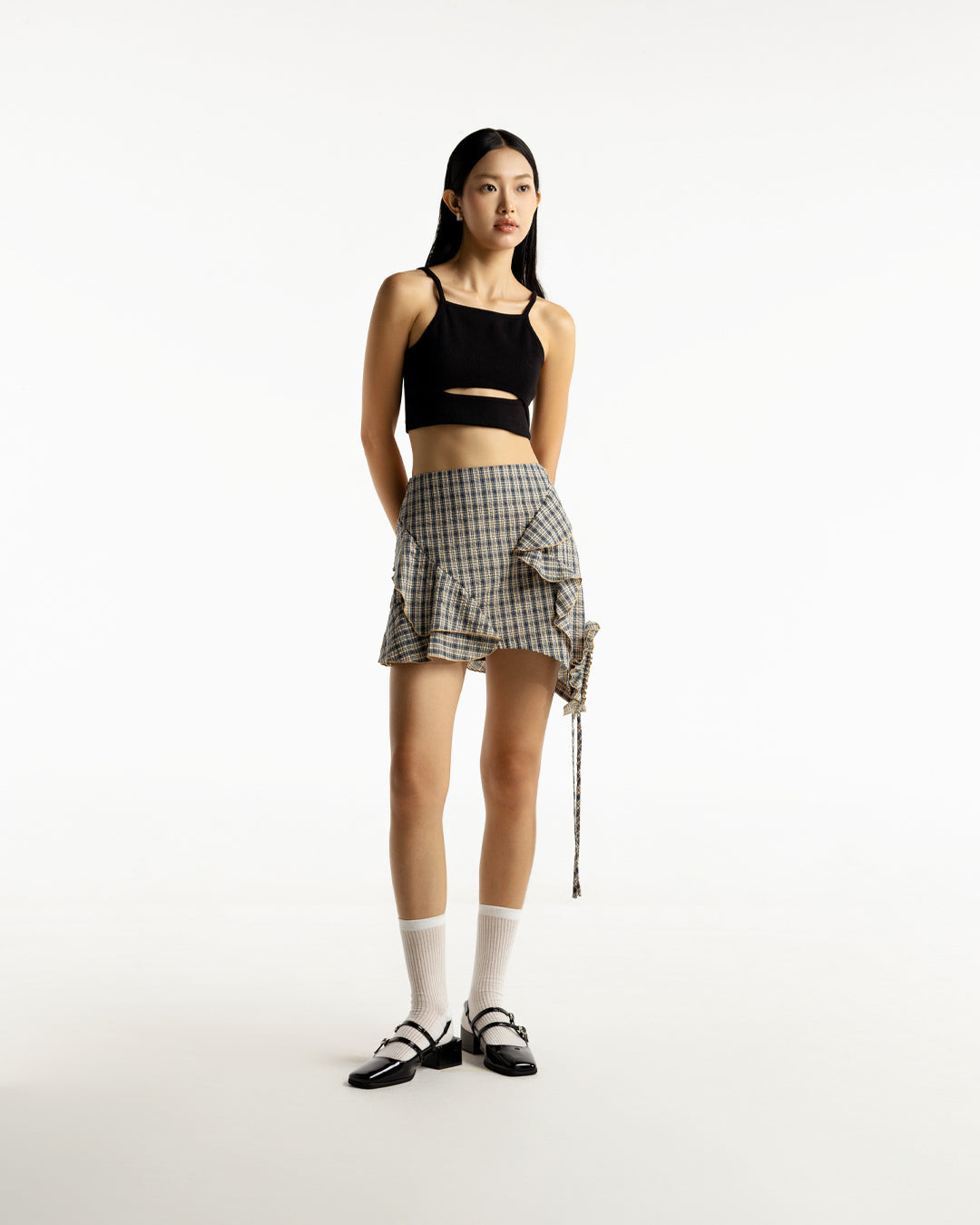 THAP THOANG SKIRT - cotton mini skirt with ruffles, flounces, and side cut-out with bow tie - ASTOUD, PROFILEMOMO.