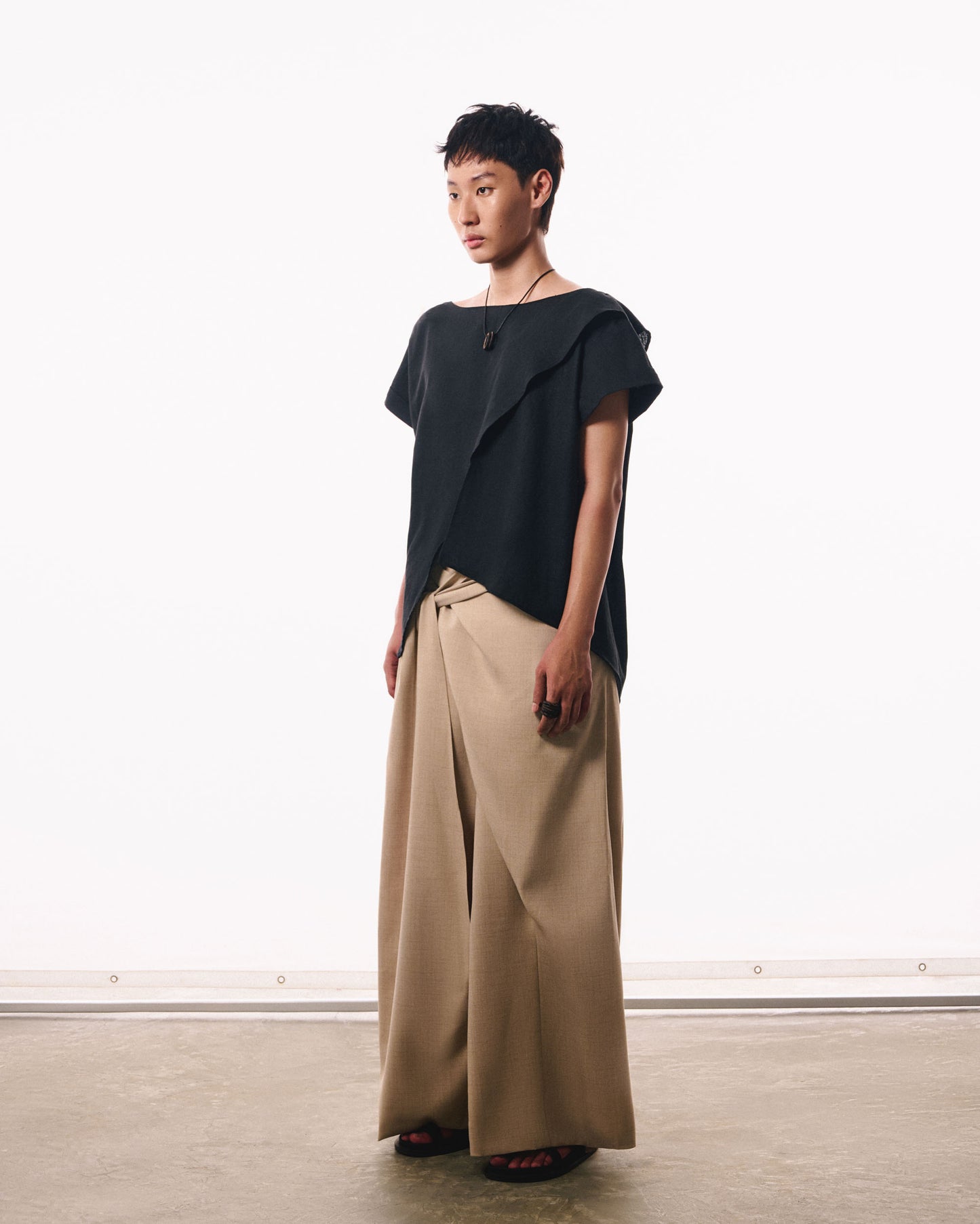 black-crossed-lapel-boat-neck-cuffed-sleeves-the-idiot
