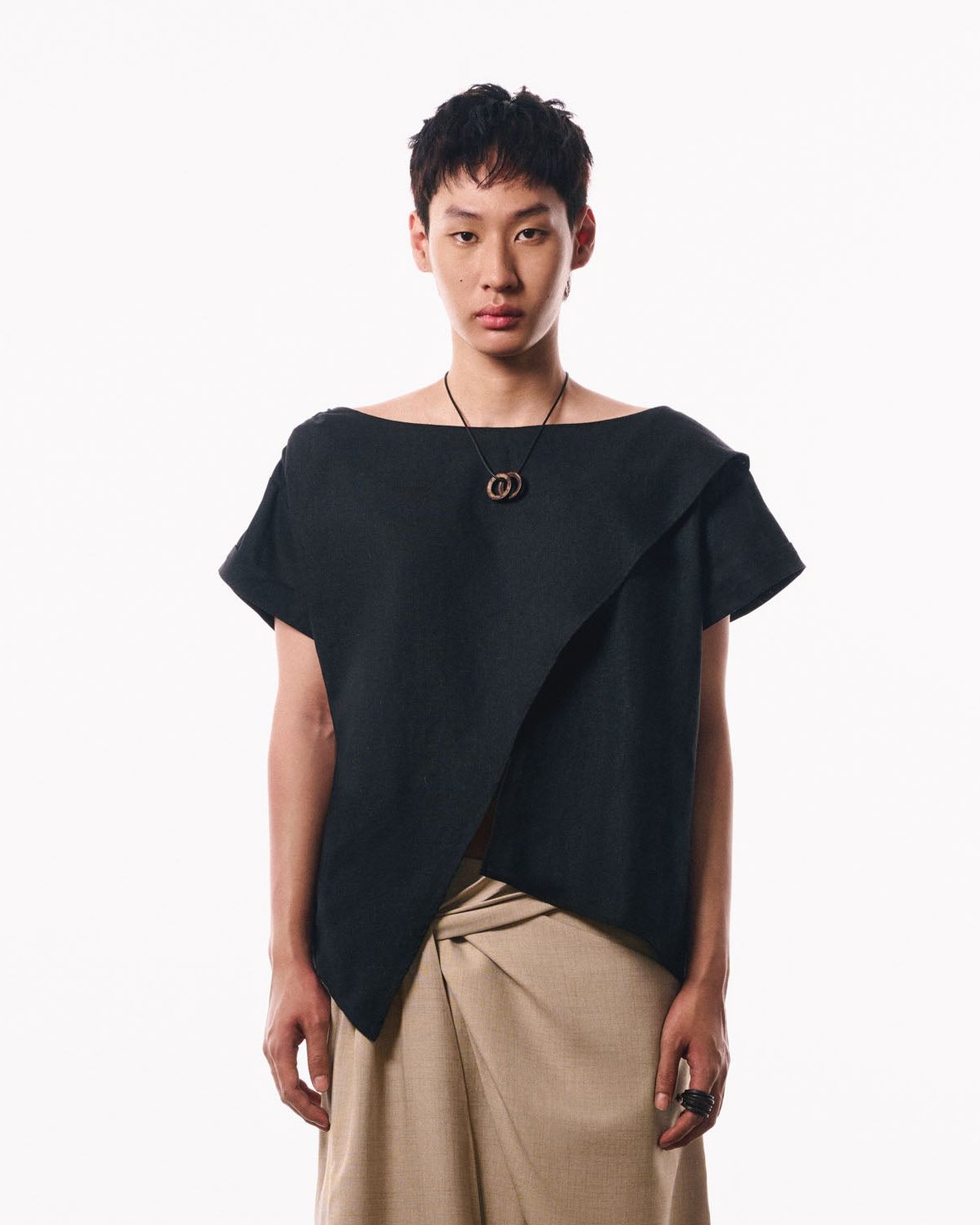 black-crossed-lapel-boat-neck-cuffed-sleeves-the-idiot